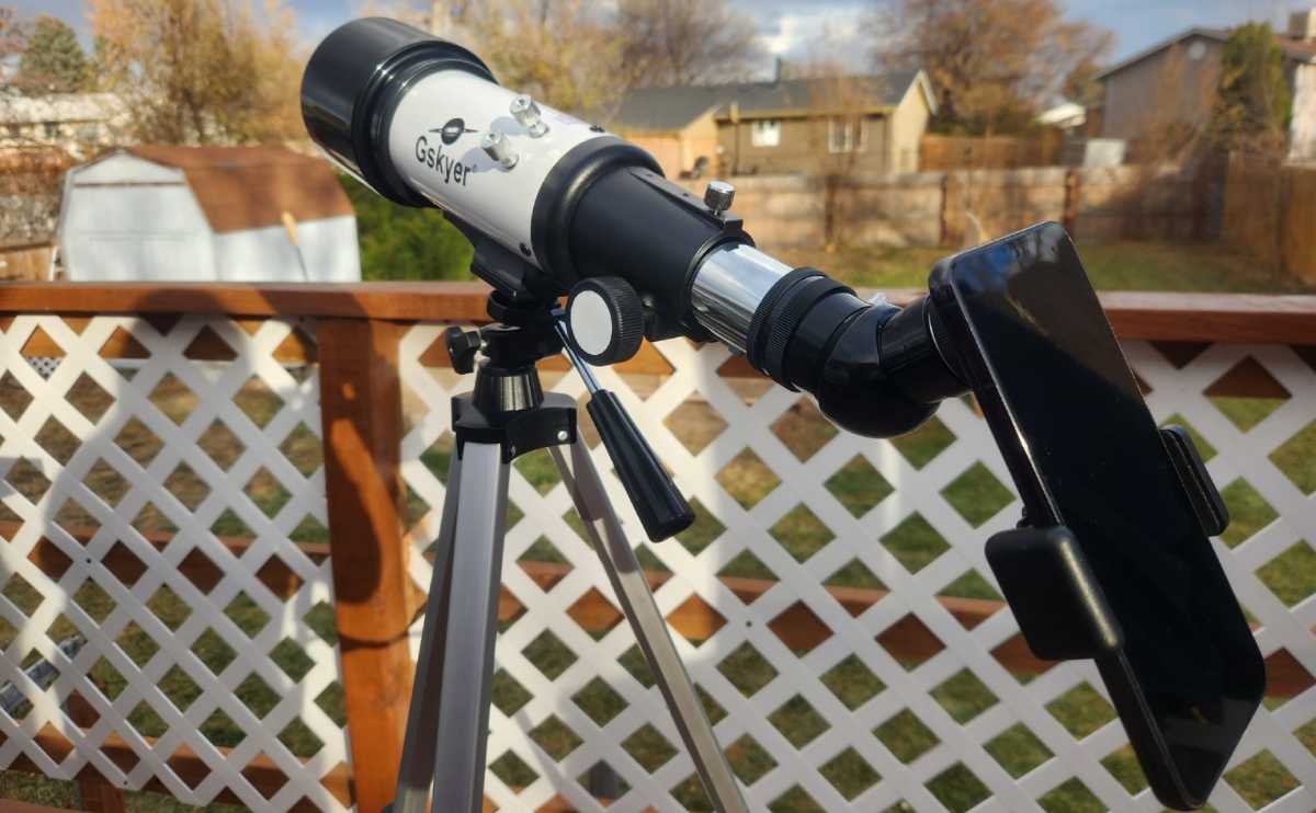 Gskyer telescope with phone attachment outside in use.