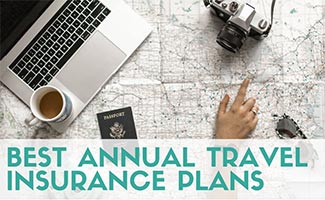 Person planning travel with map and computer (caption: Best Annual Travel Insurance Plans)