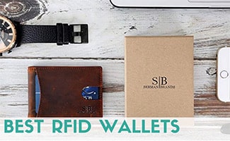 RFID wallet on table with phone and watch (caption: Best RFID Wallets)