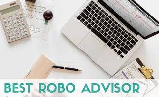 Person at desk with finances (caption: Best Robo Advisor)