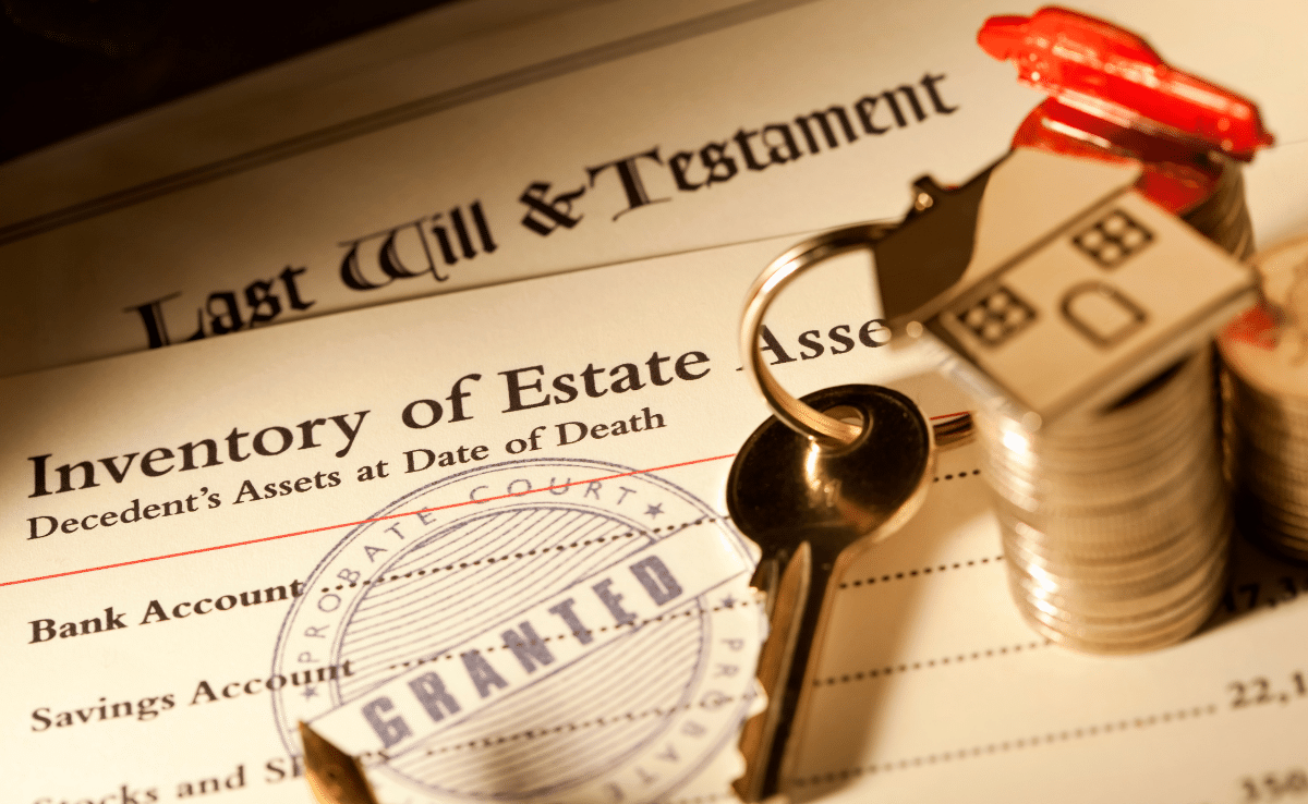 How to Create Wills Online close up of will documents with house keys and money