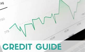 Credit score graph on screen (caption: Credit Guide)