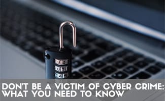 Lock on computer keyboard (Caption: Don’t Be A Victim of Cyber Crime: What You Need To Know)