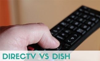 Man holding remote (Caption: DIRECTV vs DISH)