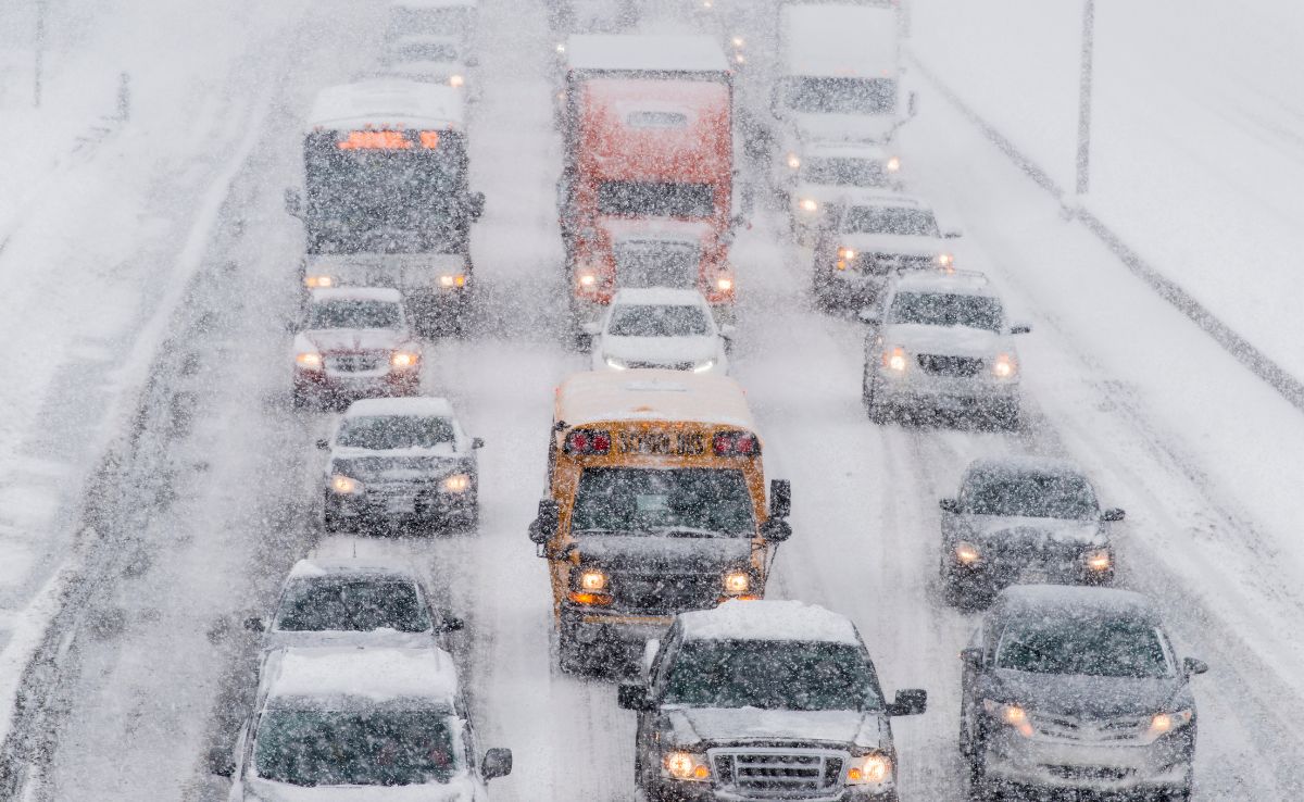 Cars driving in snow storm