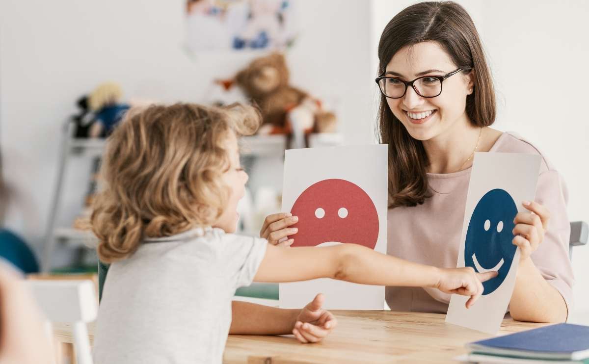 Emotion emoticons used by a psychologist during a therapy session with a child with an autism spectrum disorder.