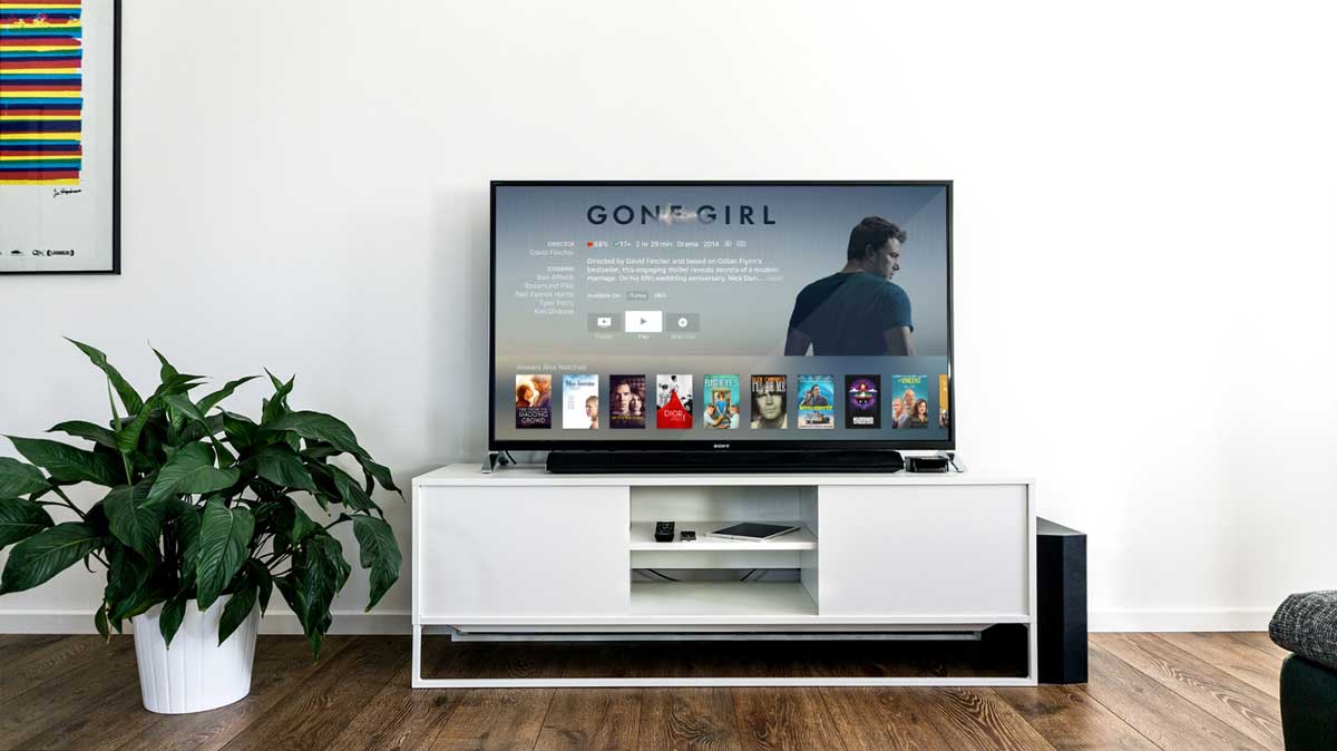 https://www.safesmartliving.com/wp-content/uploads/entertainment-center-in-a-living-room-jpg.jpg