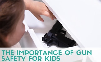 Child reaching in drawer to get gun (Caption: How To Keep Kids Safe From Guns)