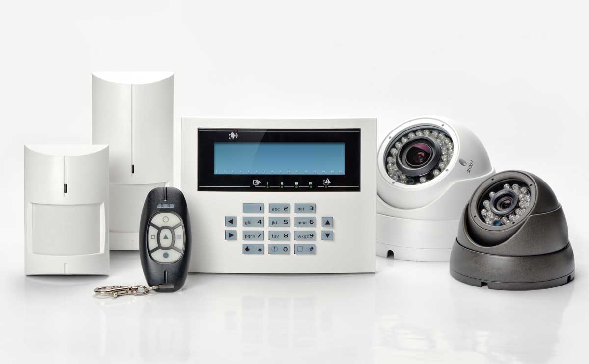 Home alarm system components on white background