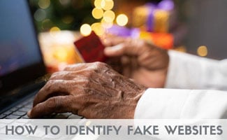 Old man shopping online with credit card in hand (Caption: How To Identify Fake Websites)