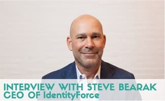 Head shot of Steve Bearak wearing a suit and smiling. Caption: Interview With Steve Bearak CEO Of IdentityForce