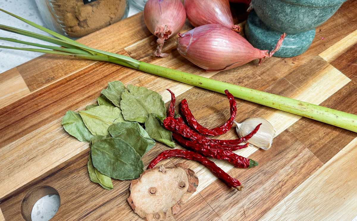 Ingredients for Panang curry on a cutting board.