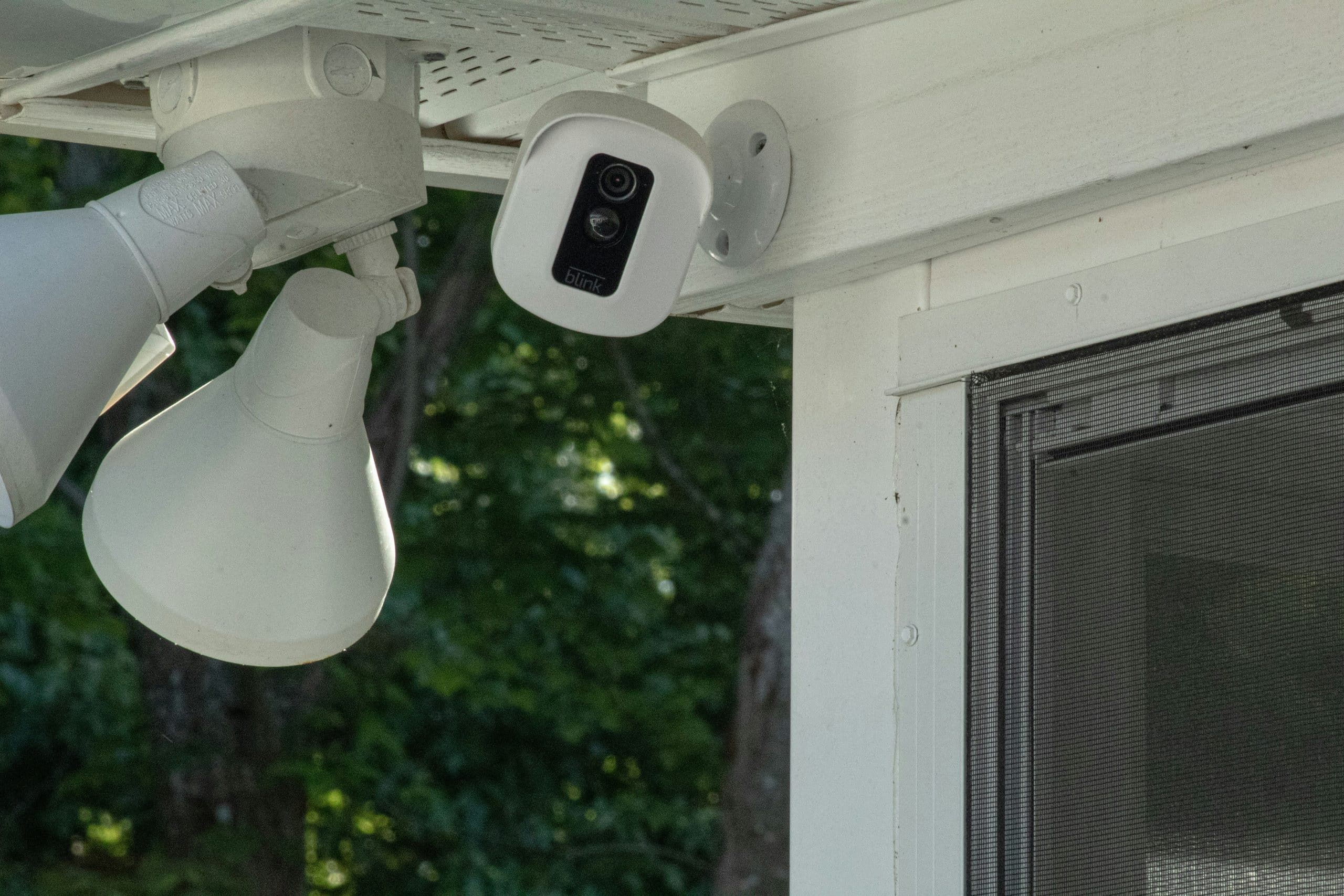Home security cameras outside, near a door