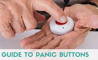 Elderly man holding panic button in hand (caption: Guide to Panic Buttons)