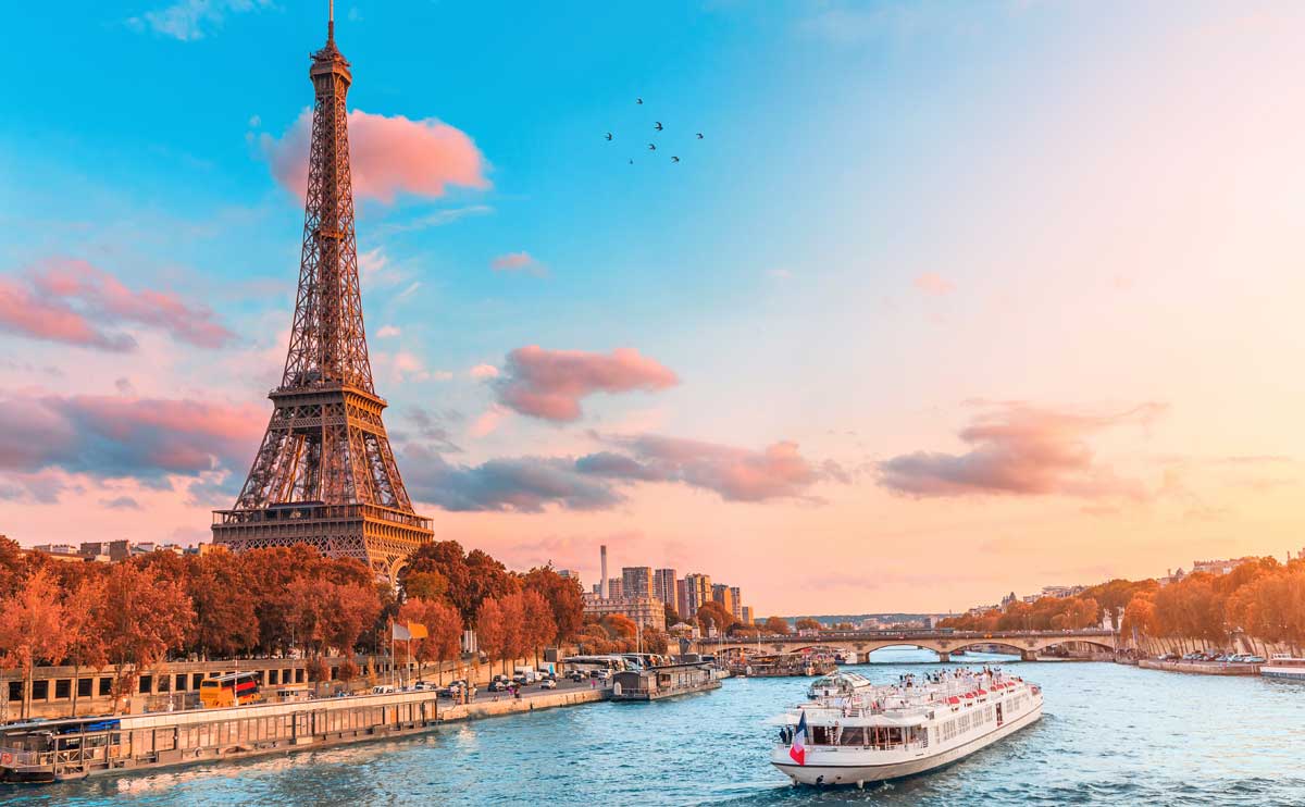 River cruise down Seine in Paris with Eiffel tower