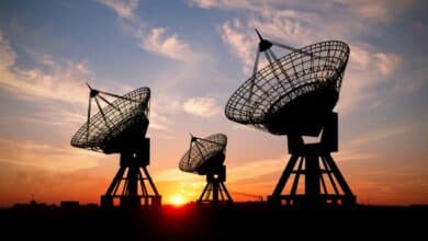 Satellite dishes at sunset.