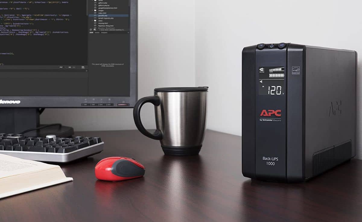 APC UPS 1000VA UPS Battery Backup and Surge Protector on desk