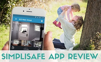 Family at the park looking at SimpliSafe camera from phone (Caption: SimpliSafe App Review)