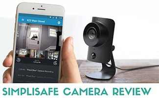 A SimpliSafe camera with smartphone app showing the feed in the foreground, caption "Simplisafe Camera Review"
