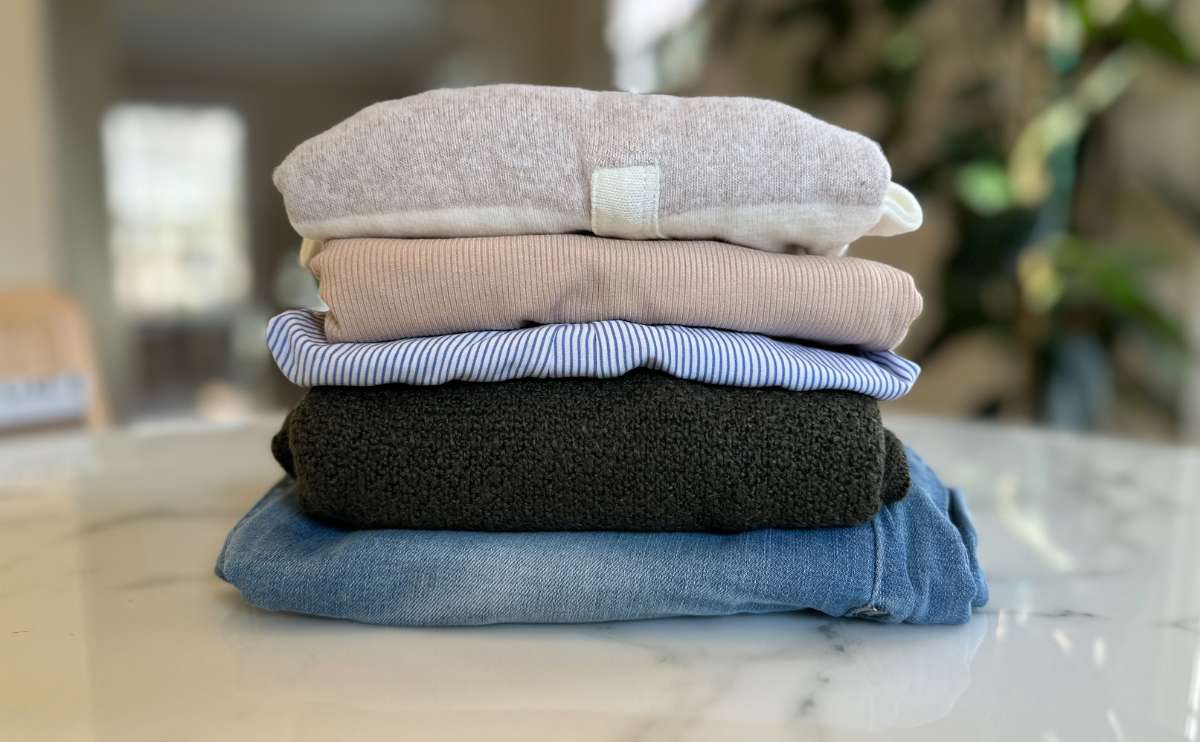 A stack of Stitch Fix clothes.