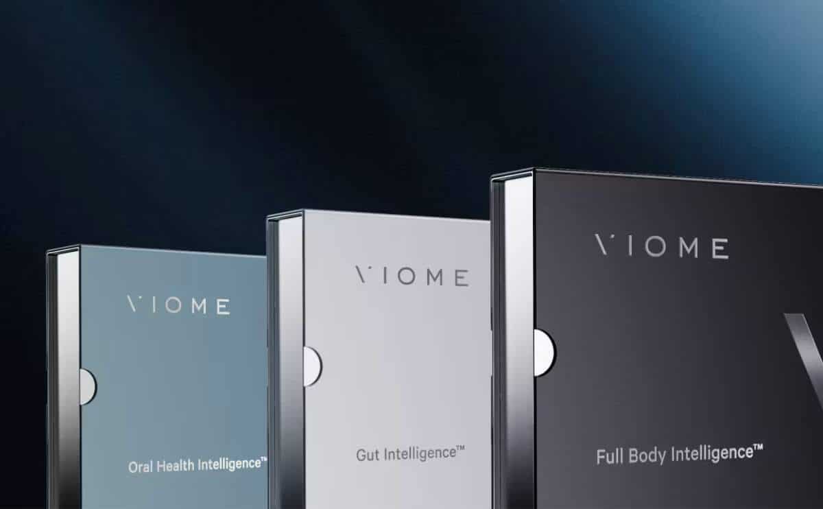 Three Viome tests on black background.