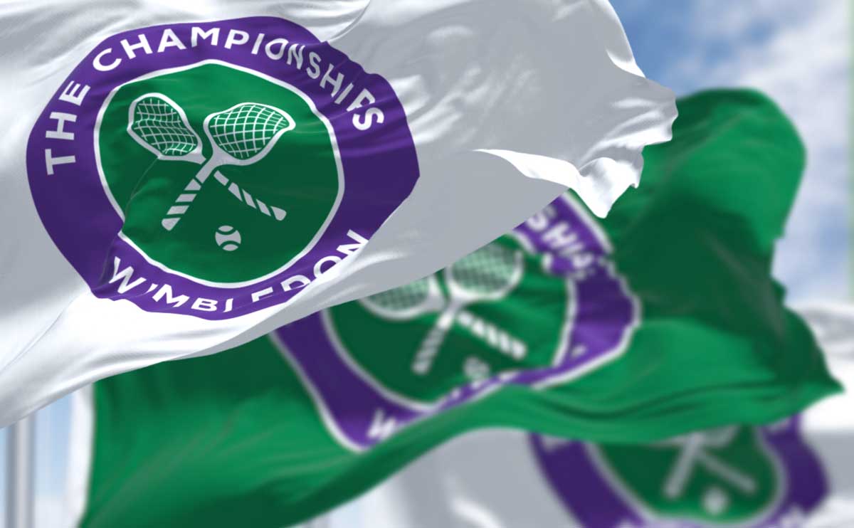 Three Wimbledon flags flying in the wind